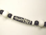 carved black horn bead