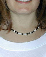 white coral and black onyx necklace