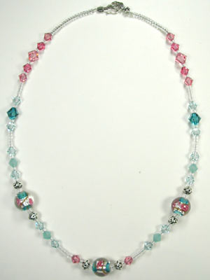 Swarovski pink and aqua with lamp glass necklace Swarovski pink and aqua with lamp glass necklace